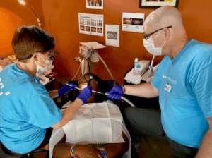 Jody and Jim Hardwick providing dental care to a Basecamp employee.